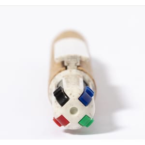 A promotional Stello Pen featuring a brown body and four ink colours: black, blue, green, and red. It has a logo.