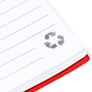 A red notepad with lined pages and a recycling symbol on the corner of the page. It features a logo on the cover.