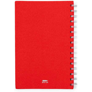 A red notepad with a spiral binding and a subtle logo at the bottom.