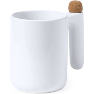 A white coffee mug with a unique design featuring a cork handle. It has a modern, minimalist look.
