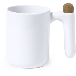 A white coffee mug featuring a unique handle and a cork accent. It has a smooth, minimalist design.