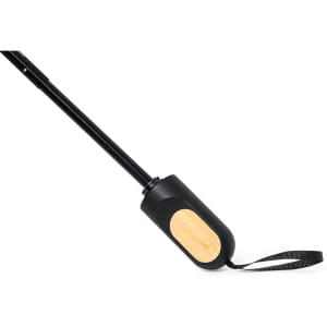 A black umbrella handle with a bamboo accent and a wrist strap, designed for leisure and outdoor use.