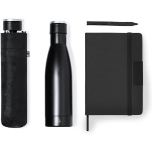 A black drink bottle, a black notebook, and a black pen arranged together, featuring a branded bottle sleeve.