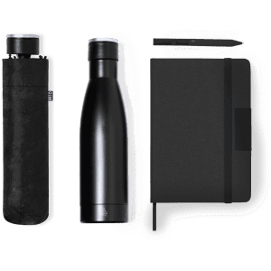 A black drink bottle, a black protective sleeve, and a black notebook arranged together. The set includes a logo.