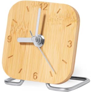 A bamboo desk clock with silver hands and a sturdy metal stand, featuring a minimalistic design.