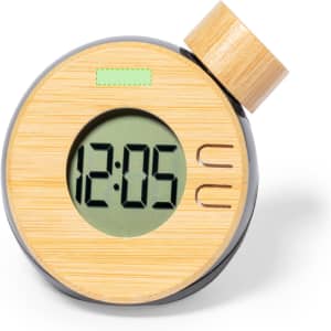 A wooden desk clock with a round design, featuring a digital display and a cylindrical top.