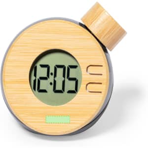 A round desk clock featuring a bamboo casing and a digital display, with a wooden knob on top.