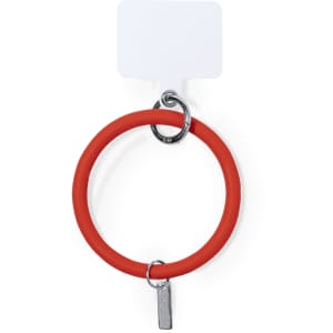 A red silicone bracelet with a metallic charm and a loop for attachment, featuring a blank label.