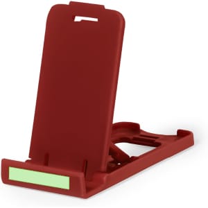 A red phone stand with a small slot for an identification card. It features a simple design and a built-in adjustable angle.