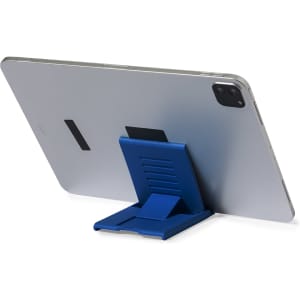 A blue phone stand supporting a silver tablet from the back, positioned upright for viewing.
