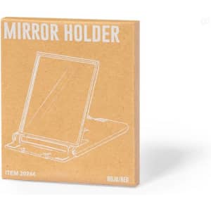 A red phone stand in packaging, featuring a simple design with a mirrored back. Includes a logo on the box.