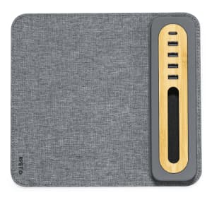 A grey multifunction mousepad with a textured surface and a wooden panel featuring four USB ports.