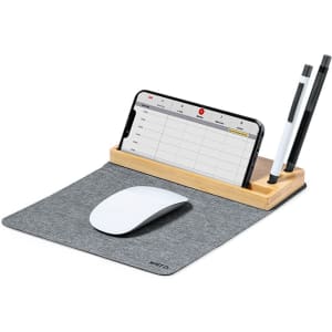 A grey multifunction mousepad with a wooden holder for a phone and two pens, alongside a white mouse.