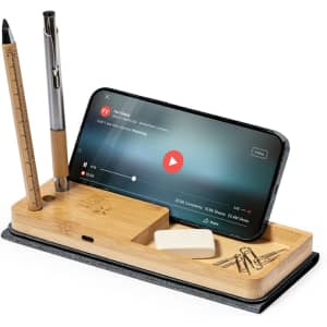 A multifunction mousepad in bamboo with a compartment for pens and a slot for a phone, featuring a sleek black base.
