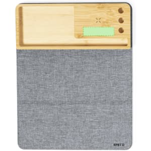 A multifunction mousepad featuring a grey fabric surface and a bamboo section with cut-outs for accessories.