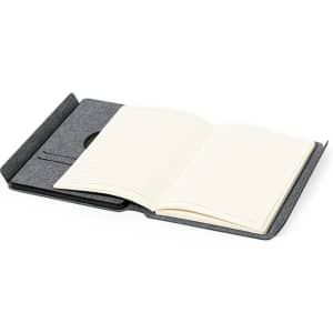 A grey multifunction notepad featuring a soft cover, an open layout, and lined pages.