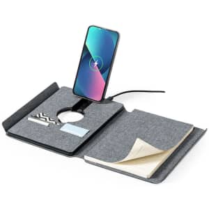 A grey multifunction notepad with a phone holder, charging dock, and space for cards and notes.