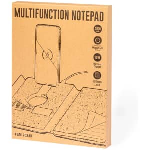 A multifunction notepad with a wireless charger, featuring a phone slot and lined sheets, in a cardboard design.