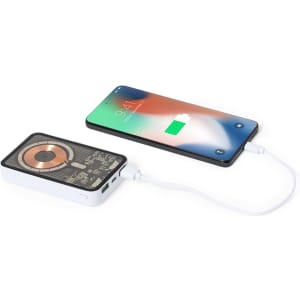 A power bank in white connected to a smartphone, showcasing a black and metallic design.