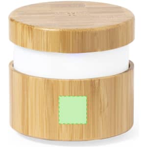 A bamboo container with a white interior, featuring a lid and a small green square on the front.
