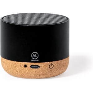 A compact black speaker with a cork base, featuring a logo and ports on the side.