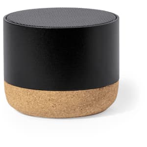 A round speaker in black with a cork base, featuring a textured top. It has a simple, modern design.