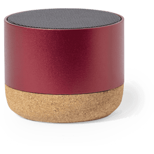 A red cylindrical speaker with a textured top and a cork base, featuring a logo on the surface.