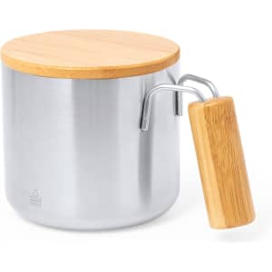 A stainless steel insulated mug with a bamboo lid and a wooden handle. It features a logo on the surface.