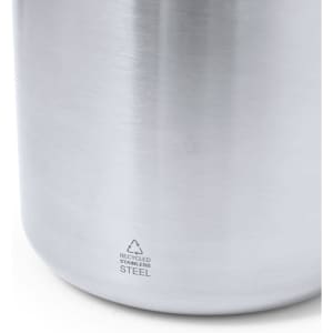 A stainless steel insulated mug with a brushed metallic finish and a small logo at the base.