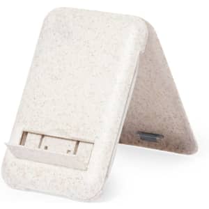 A phone stand in a textured off-white colour, with an integrated charging port and adjustable angle.