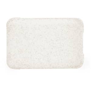 A rectangular tray in a speckled off-white colour with rounded edges.