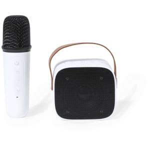A white karaoke speaker with a black mesh front and a wireless microphone, featuring a brown strap.