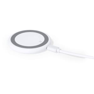 A wireless charger in white with a circular design and a grey accent, featuring a connected charging cable.