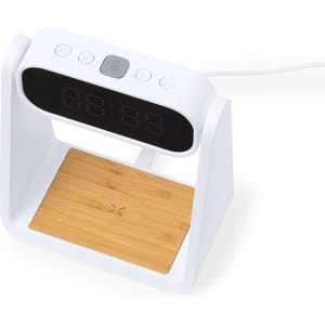 A white multifunction alarm clock with a digital display and a bamboo base, featuring control buttons on the front.