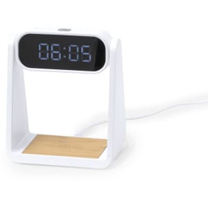 A white multifunctional alarm clock featuring a digital display and a bamboo charging platform.