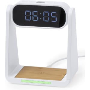 A white multifunction alarm clock with a digital display and a bamboo charging pad. It features a sleek, modern design and a logo.