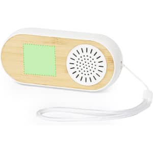 A wooden and white speaker with a green panel and a lanyard for easy carrying. Features a circular speaker grill.