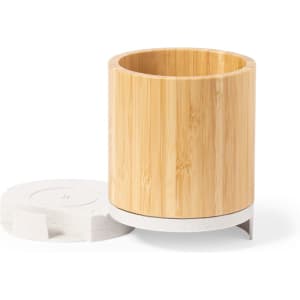 A bamboo pencil holder with a textured white base, featuring a removable lid.