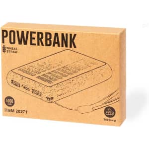 A power bank in a kraft paper box, featuring three USB ports, made from wheat straw, with a capacity of 5000 mAh.