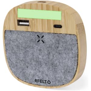 A wireless charger in a circular design, featuring bamboo and grey felt, with USB and USB-C ports.