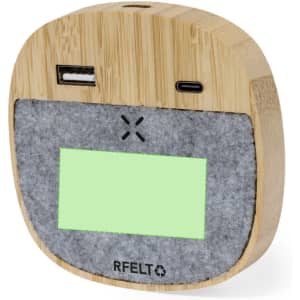 A wireless charger with a bamboo and grey felt design, featuring USB and USB-C ports and a logo.