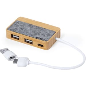 A bamboo USB hub features a felt top, two USB ports, and a USB-C connector, connected by a white cable.
