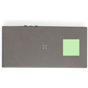 A grey multifunction alarm clock with a textured surface and a green square highlight, featuring a logo.