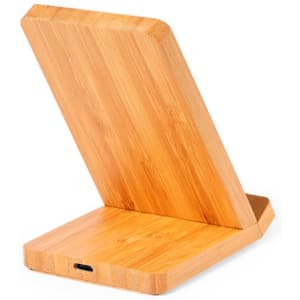 A wireless charger with a sleek bamboo design, featuring a standing position and a USB port.