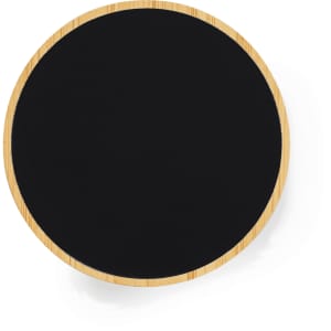 A round wireless charger with a black charging surface and a bamboo border. It features a logo on the design.