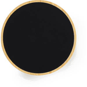 A wireless charger in a circular shape with a black surface and a bamboo edge. It features a logo.