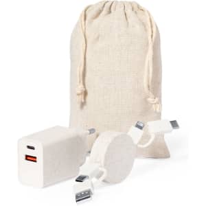 A Pylot Chargers Set featuring a cream-coloured charger and two charging cables, all in a fabric drawstring pouch.