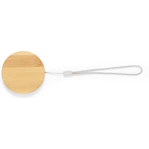 A round bamboo keychain with a silver loop for attachment. The keychain has a smooth, natural finish.