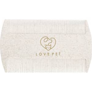 A pet grooming brush in cream colour featuring a logo and two combing sides for effective pet care.