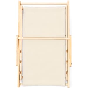 A folding pet chair with a cream fabric seat and a natural wooden frame. Features a simple, minimalist design.